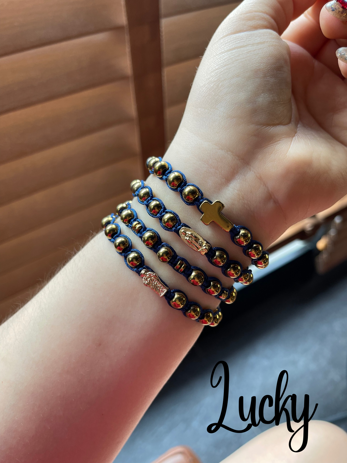 Pulseras tejidas de hematita con dijes