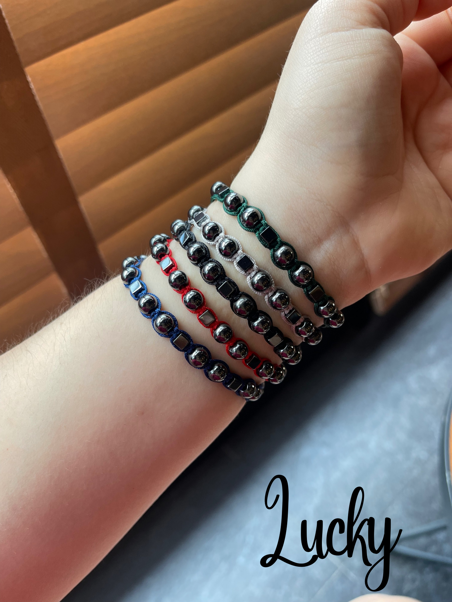 Pulseras tejidas de hematita plata