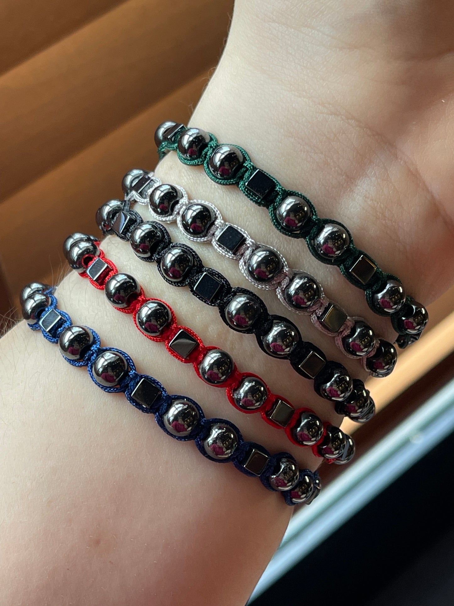 Pulseras tejidas de hematita plata